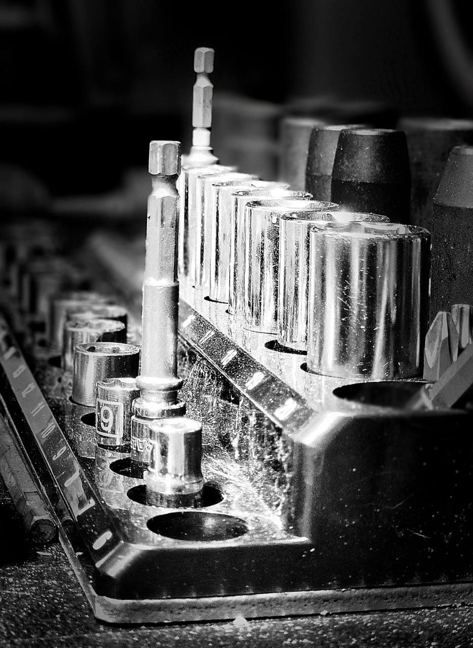Sockets and driver bits arranged in a tool tray